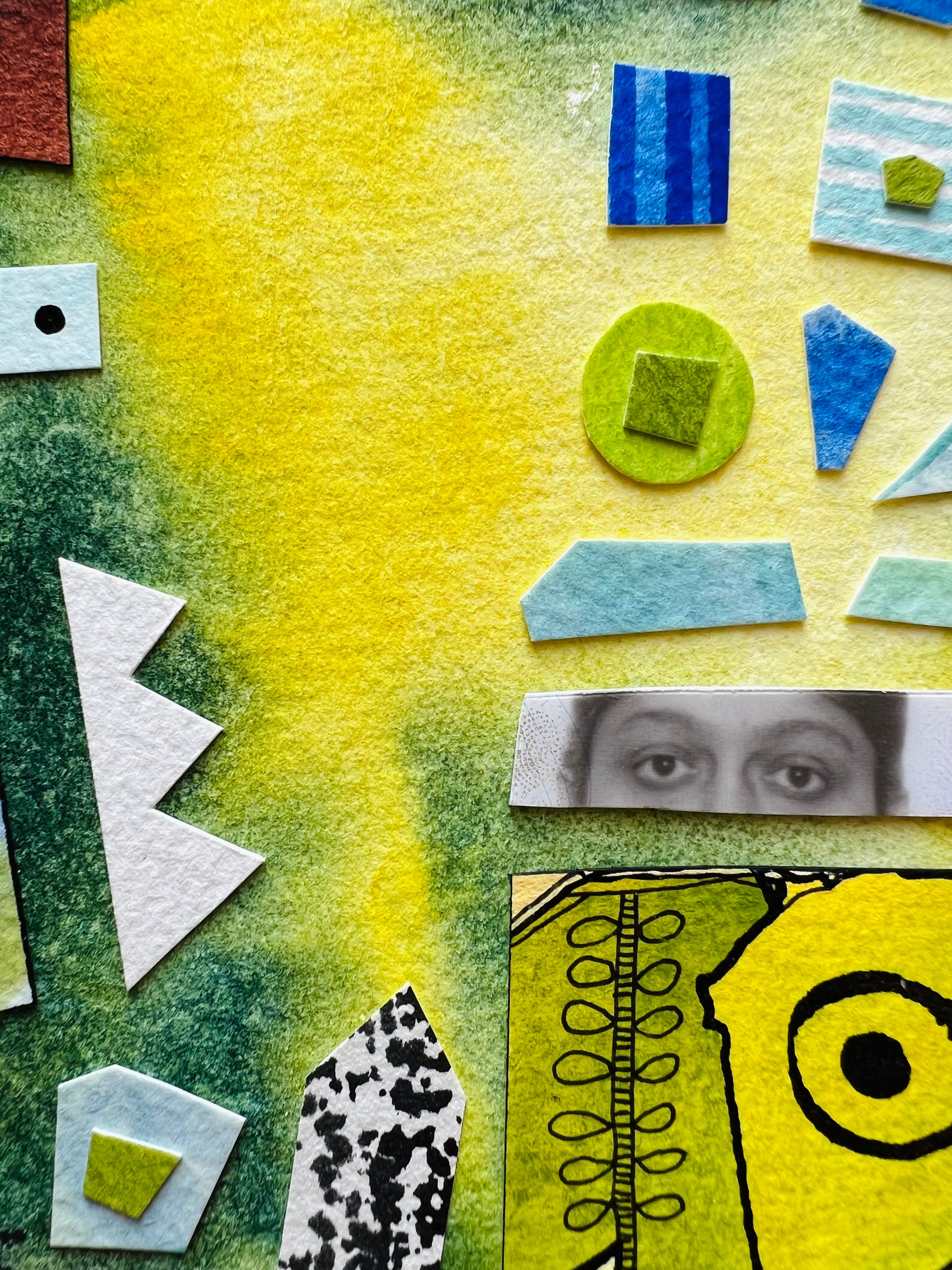 Colorful abstract art piece with geometric shapes and a black and white photo of a face.